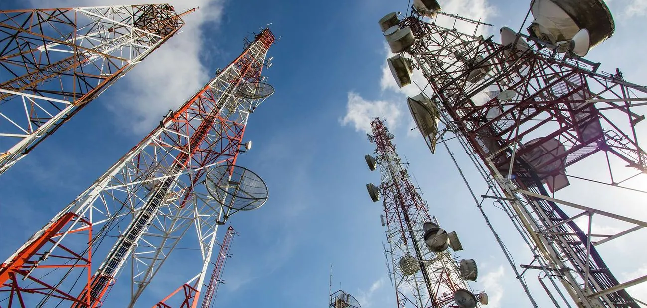 Telecom towers with antennas and dishes